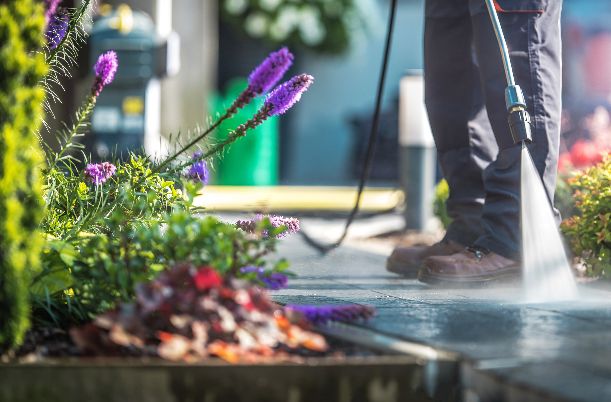 A stone patio is pressure washed in Burlington, VT